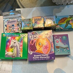 Puzzle lot of small puzzles flat and 3d ages vary 5-8 new nwt and sold as lot